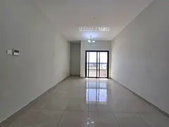 Al Jurf 3, behind the Chinese Market, near Ajman Festival City, a two-bedroom apartment with a livin