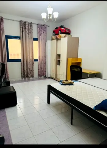 Fully Furnished Bedroom Available for Rent in Mankhool Family building.