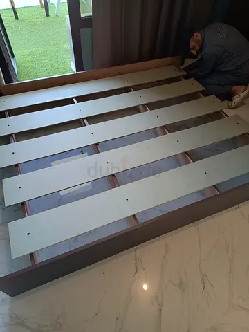 Queen size wooden bed