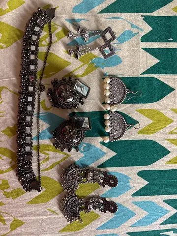 Set of silver-tone oxidized ethnic earrings and necklace