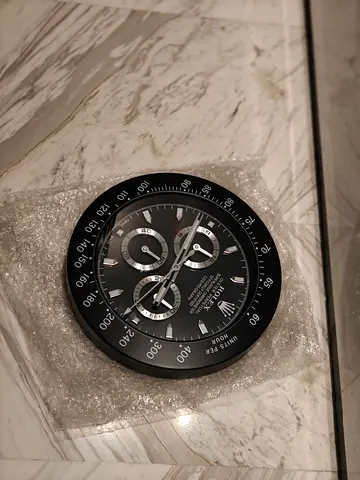 Wall clock Rolex