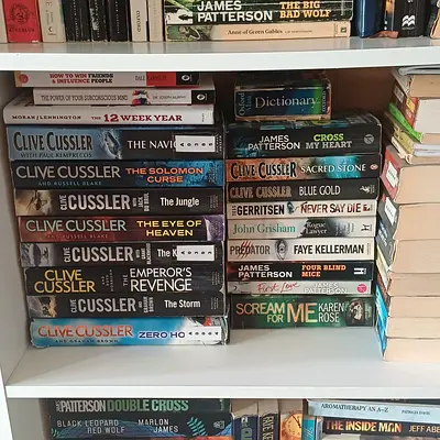 Used paperback thriller and adventure novel collection (Clive Cussler, James Patterson, John Grisham