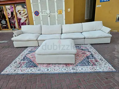 Feather 🪶 filled Modular swin sofa with footstool