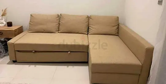 Beige L-shaped Sofa bed with Storage — Good Condition