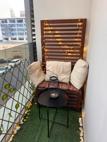 Cozy Balcony Bistro Set with Cushions and Side Table