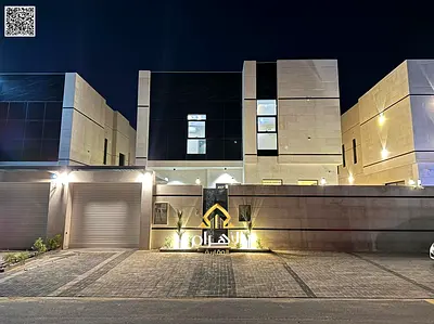 Luxury villa for sale in Al Bahia area, featuring two floors and a rooftop terrace. Modern design, spacious living areas, reception halls, and compreh