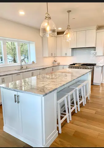 White Kitchen Island with Marble Effect