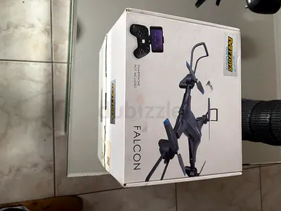 Falcon drone with remote and extra wings