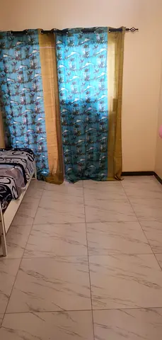 Neat and clean family room with attached Big Balcony direct from Owner for working couple.