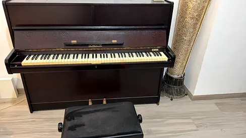 Upright Piano in Good Working Condition with Bench