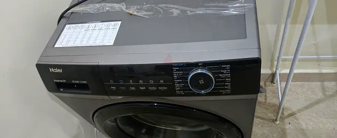 Haier front load washing machine - gray, good working condition