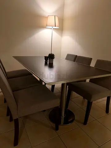 Elegant 8 seater Dining table with 5 chairs