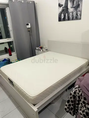 Queen-size mattress with white wooden bed frame - good condition