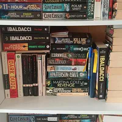 Used paperback thriller and adventure novel collection (Clive Cussler, James Patterson, John Grisham