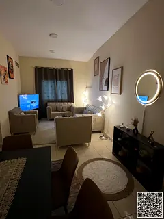 Luxurious two-bedroom apartment with a living room, fully furnished, and featuring a balcony with se