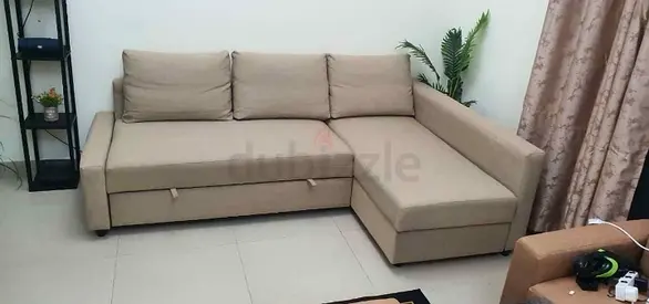 Beige L-shaped Sofa bed with Storage Good Condition