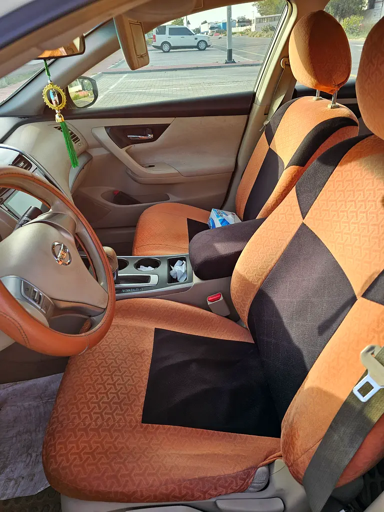 Nissan Altima 2013 — photo 1 of 4