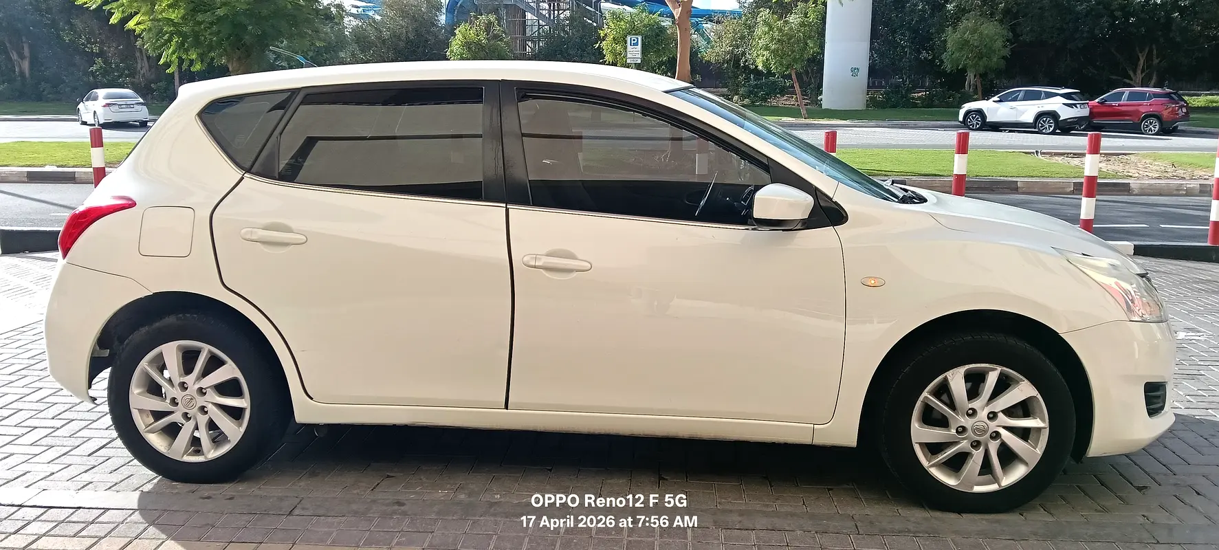 Nissan Tiida 2014 — photo 1 of 6
