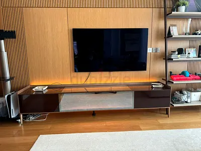 Custom-made TV stand / media console by Rimadesio
