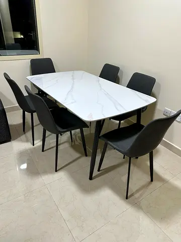 Modern 6-Seater Dining Table with Faux Marble Top and Black Chairs
