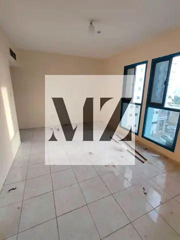 Apartment for rent in Al Majaz 1, 3 bedrooms and a living room. Explicit shared rental agreement.