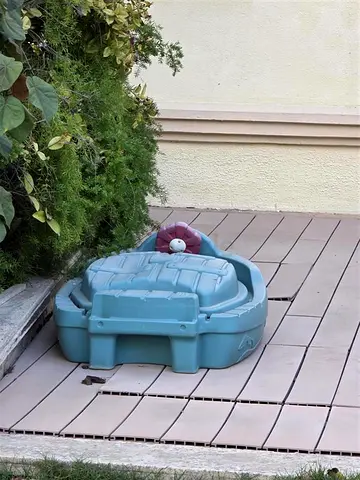 STEP2Little Tikes-style plastic playhouse / activity panel with sandpit