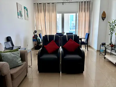 Pair of Black Recliner Armchairs with Red Cushions - Excellent Condition