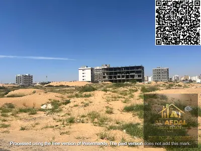 Commercial/residential corner plot for sale on two streets in Ajman, Al Alia Global area. Ownership available to all nationalities. Unbelievable price