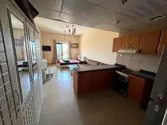 Furnished studio apartment in Tower C, Al Nuaimiya 1, Ajman. Free parking, balcony, and free mainten