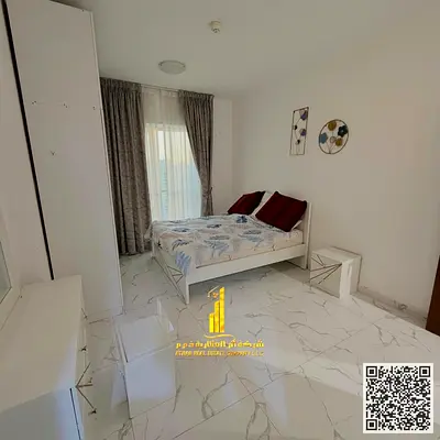 Fully furnished one-bedroom apartment with a hall, with open view, including all services, with a gym, swimming pool, and private parking.