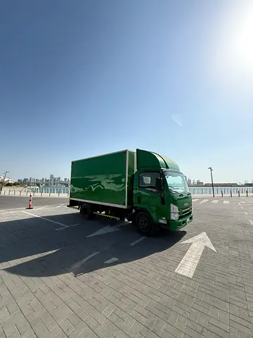 ISUZU WITH BOX LOW MILEGE