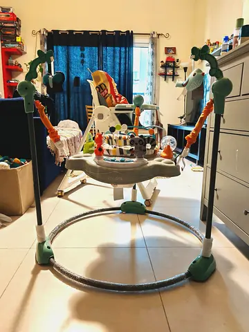 Baby Jumper/Exersaucer with Toys - Good Used Condition