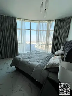 For monthly rent: a luxurious three-bedroom apartment with a living room, furnished with high-end an