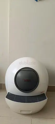 Electric self cleaning litter box