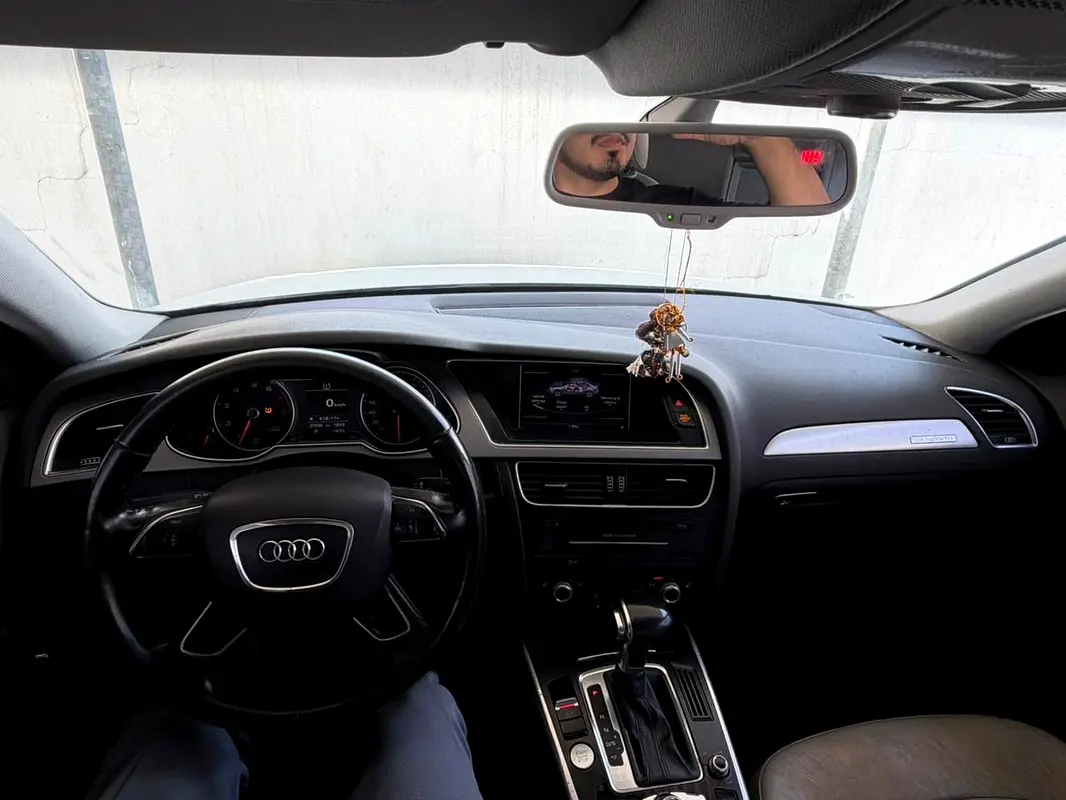 Audi A4 2013 — photo 1 of 9