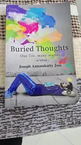 Reading Book - Buried Thoughts (Joseph Annamkutty Jose)