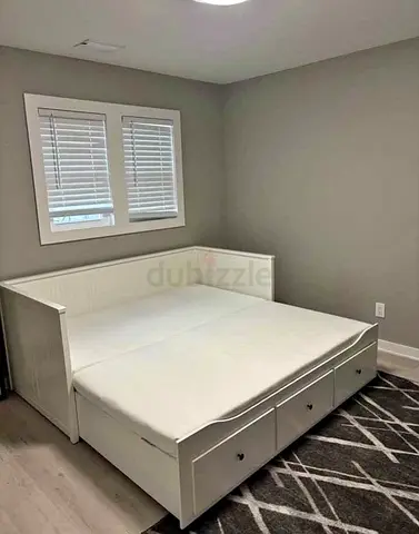 IKEA Hamnes day bed with 3 big storage drawers underneath and with 2 IKEA mattresses is available