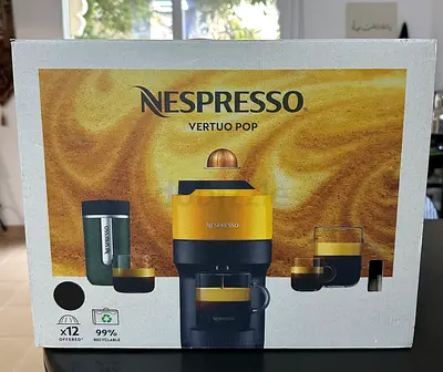 Very lightly used Nespresso Vertuo Pop machine in excellent condition.