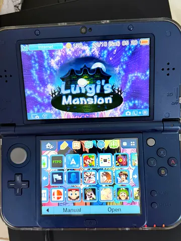 Used new Nintendo 3DS XL with games modded and 64gb memory card (Luigis Mansion shown)
