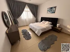 Beautiful furnished one-bedroom apartment with new furniture for monthly rent in Ajman - Al Bustan -