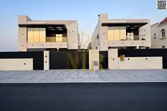 Luxury villa in Al Muwaihat 2, modern design with a yard, outdoor seating area, and central air cond