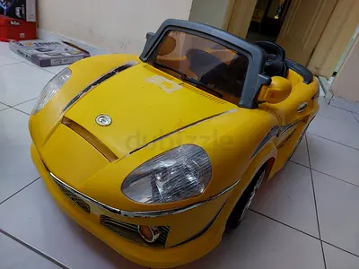 Yellow Ride-On Electric Toy Car for Kids (Used)