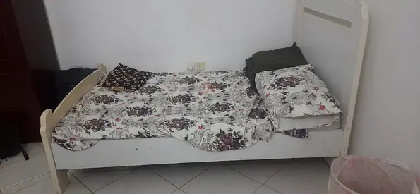 Double white wooden bed frame with mattress included — good condition