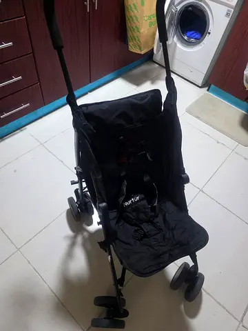 NURTUR Lightweight black umbrella stroller - single seat, folds compact