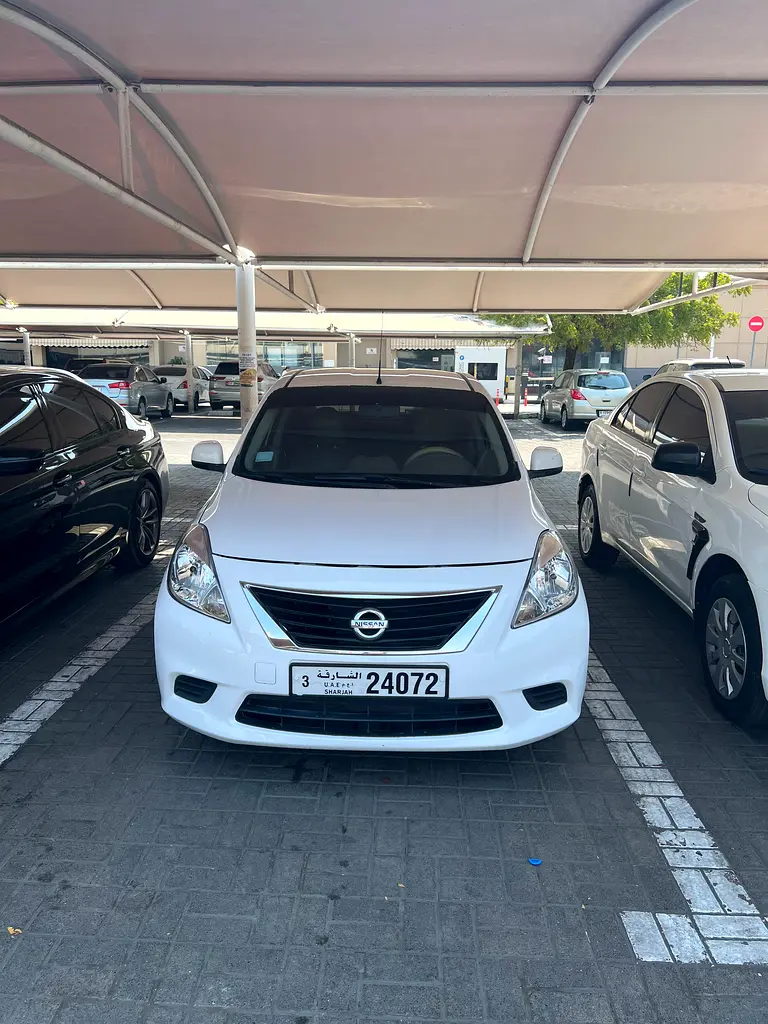 Nissan Sunny 2014 — photo 1 of 4