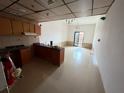 A studio apartment is available for annual rent in Al Nuaimiya 1, Tower C. It boasts a prime location next to Al Hikma School and close to all essenti