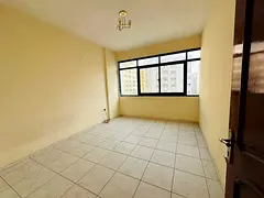 Free AC \ 1BHK \ Spacious layout \ Open view \ Flexible payment \ Family building \ Prime location \