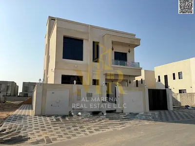 فيلاشارع وسكة للبيع بالزاهية بعجمان  طابقين ورو ف بسعر شامل تكييف مركزي  مساحة 3100قدم