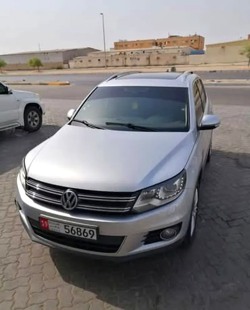 Volkswagen Tiguan 2013 — photo 1 of 4