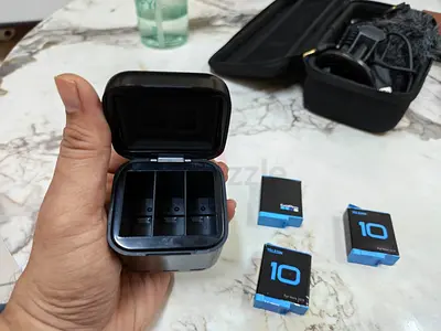 GoPro HERO 9 and Batteries with 3-Bay Charger (spare batteries included)